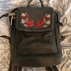 Embroidered faux suede bag